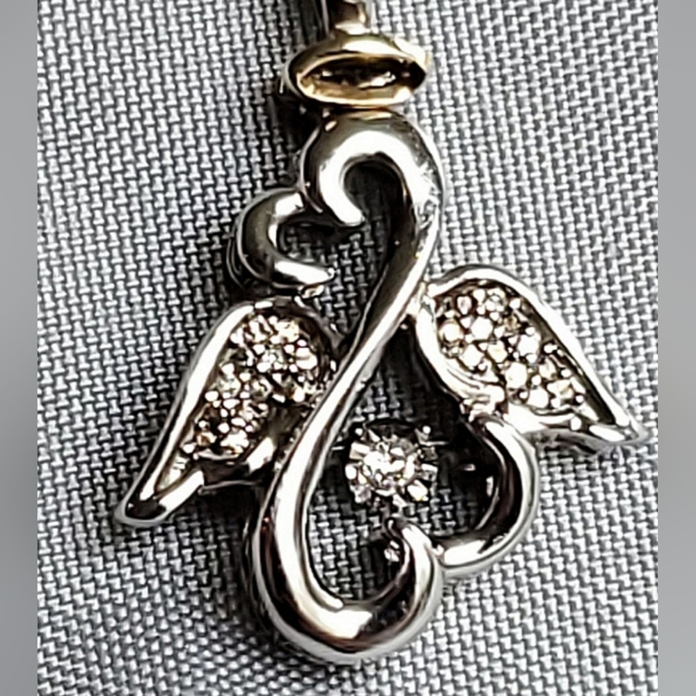 Jane Seymour Hearts in Rhythm Angel 10K and sterling pendant